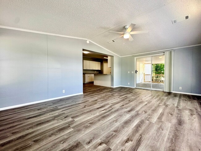 Building Photo - Privacy and Space in this 3/2 Home at the ...