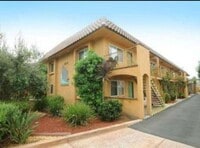 Building Photo - 2 bedroom condo- top floor- with  detached garage