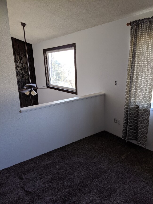 Bedroom atrium overlooks the living area downstairs - 2115 Pleasanton St