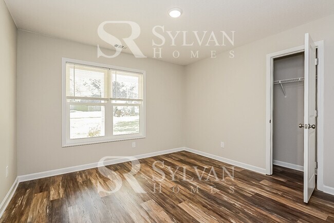 Building Photo - The living is easy in this 3 bedroom, 2 bathroom home