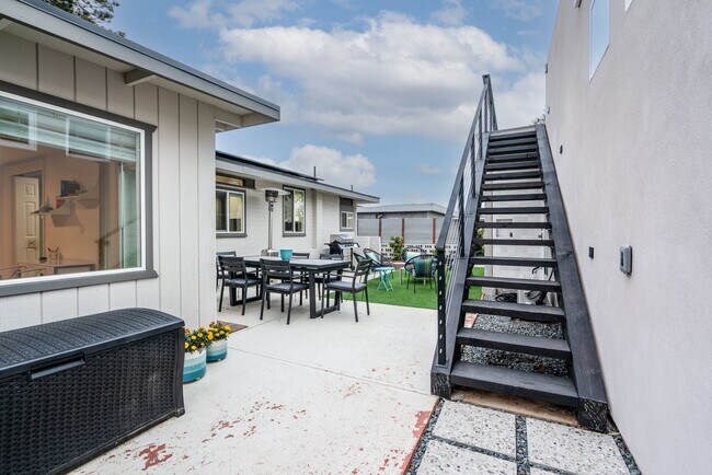 Building Photo - Enjoy stunning sunsets and beach living at its finest, Short Walk to Beach