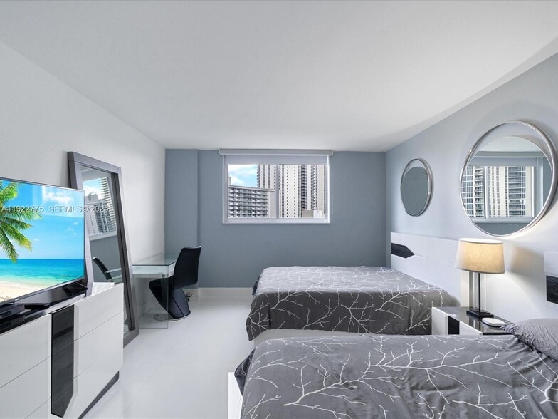 Building Photo - 19370 Collins Ave