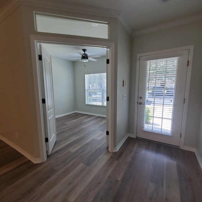 Bedroom at front of home 10'x10' with closet - 5808 Fishhawk Ridge Dr