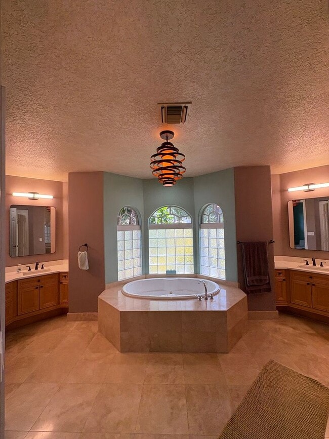 Building Photo - Spacious 3/3.5 3 car garage home in Palm City