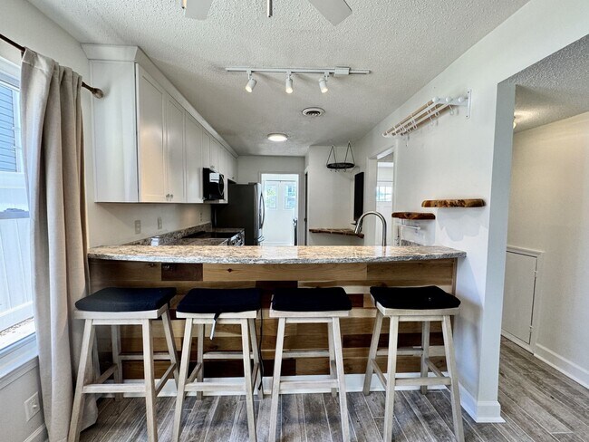 Building Photo - Ready NOW! A Custom Townhouse-Style Duplex Blocks to the Beaches! Fenced Yard - Hot Tub - Pet Fri...