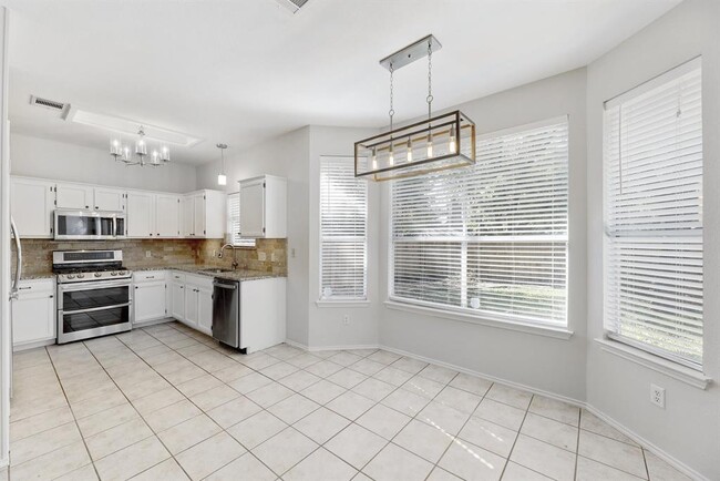 Building Photo - 7408 Tovar Dr