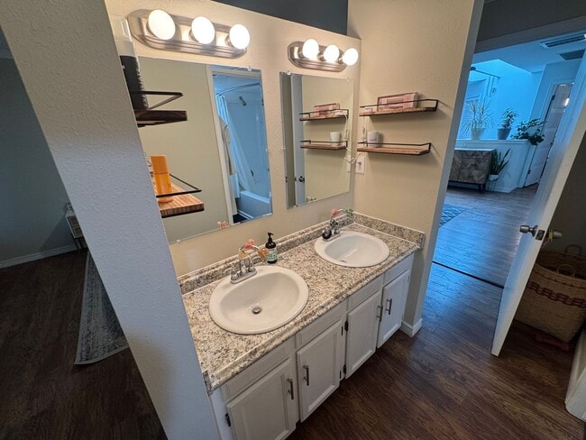 Building Photo - Bright 2BR Townhome with 3 Balconies & Private Patio