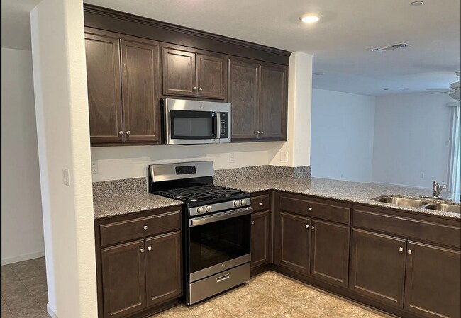 Building Photo - Two weeks free rent  "Spacious 4-Bedroom Haven with 2 Full Baths in Merced – Your Dream Home Awai...