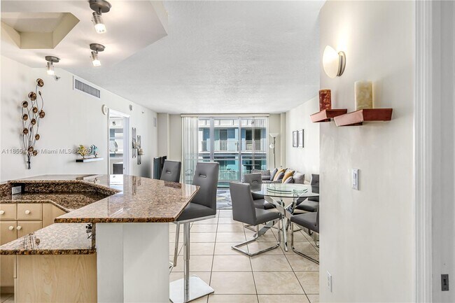 Building Photo - 6917 Collins Ave