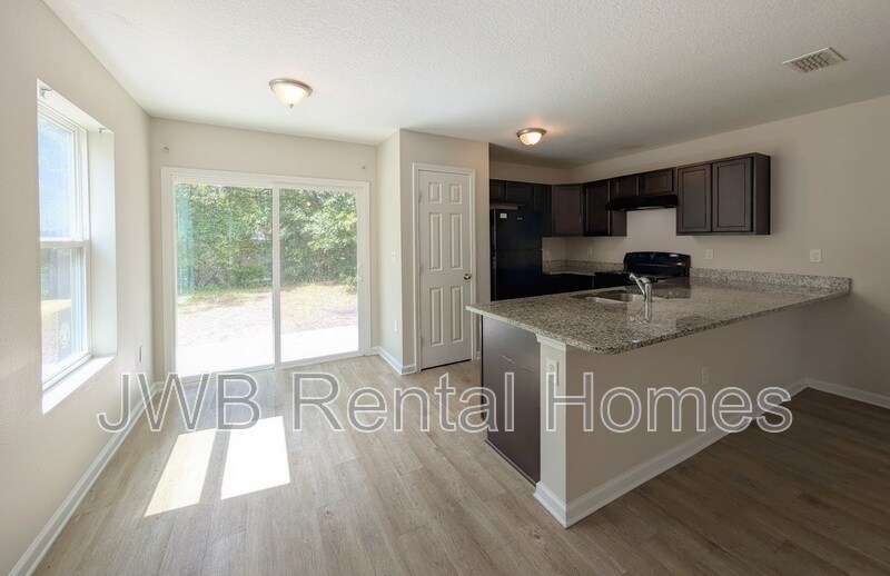 Building Photo - 7804 Playschool Ln