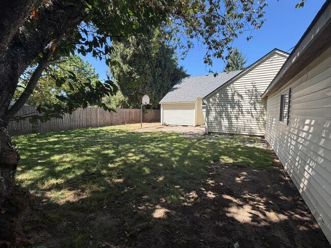 Building Photo - 2 Bedroom with a garage with Large fenced yard!