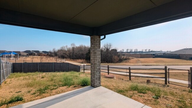 Building Photo - Spacious Yukon Home with Storm Shelter, 2-Car Garage & Fenced Yard!