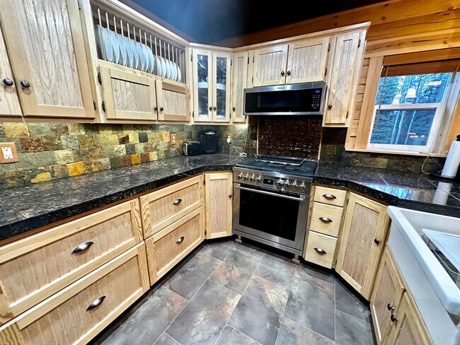 Building Photo - ** SEASONAL RENTAL ** YOUR ALASKAN CABIN I...