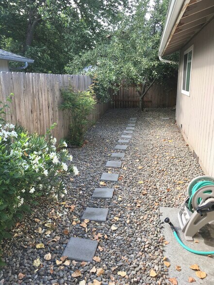 Path to fenced side yard - 204 Gibson St