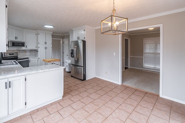 Building Photo - Welcome to this stunning 4-bedroom, 3-bathroom home located in the vibrant neighborhood of Kriste...