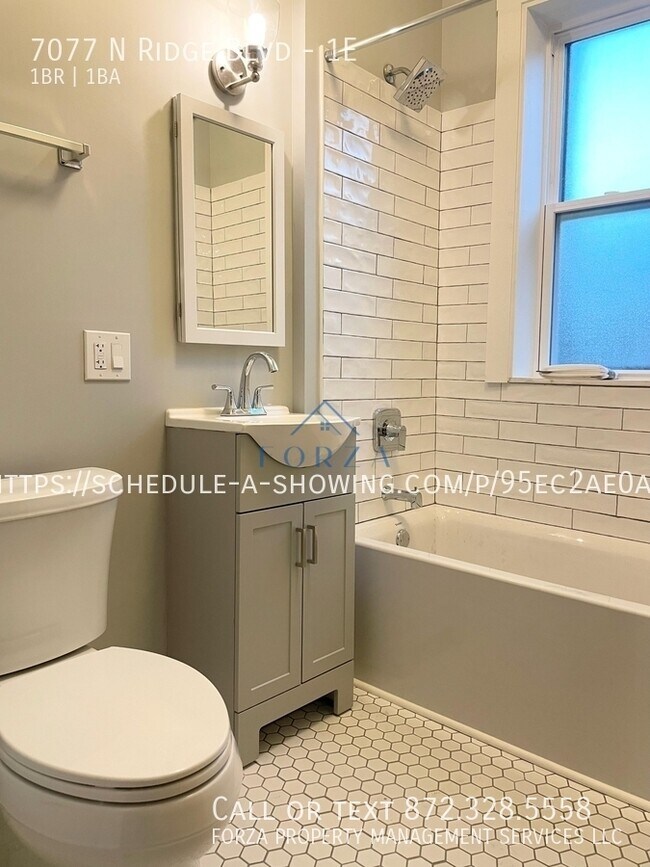 Building Photo - 7077 N Ridge Blvd