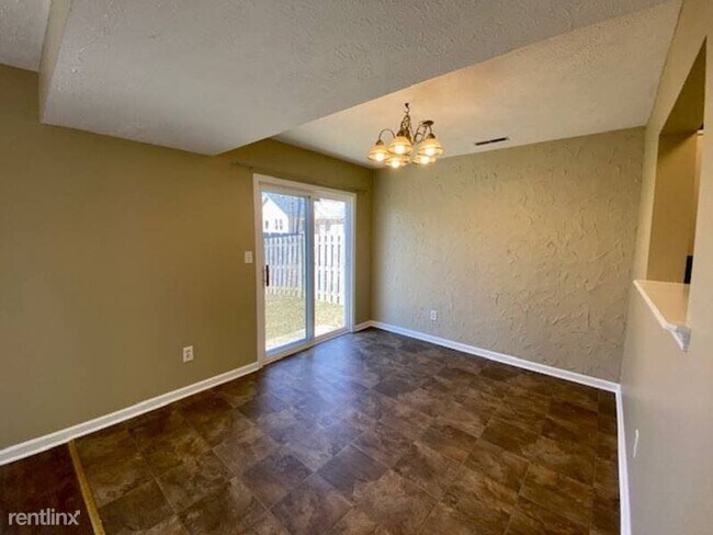 Building Photo - 3 br, 2.5 bath House - 6364 Titania Drive