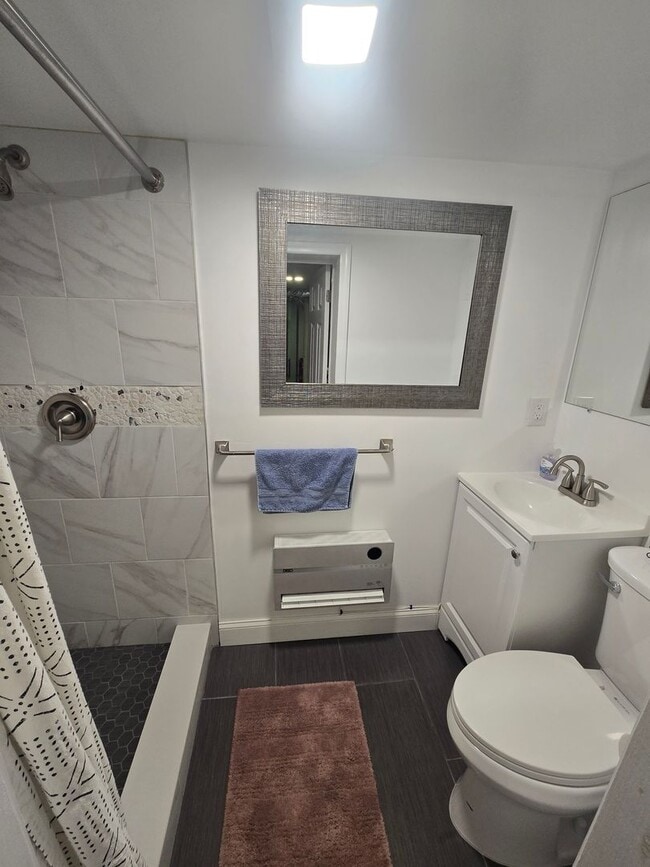 Building Photo - Spacious, meticulously renovated single family: 2-bedroom, 2 full bathroom & finished basement an...