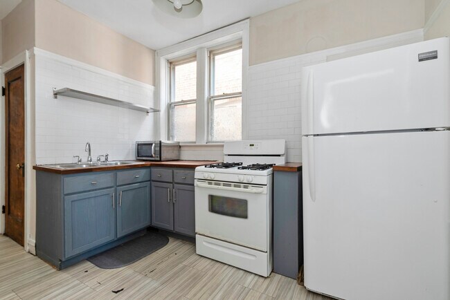 Building Photo - 7422 S Bennett Ave