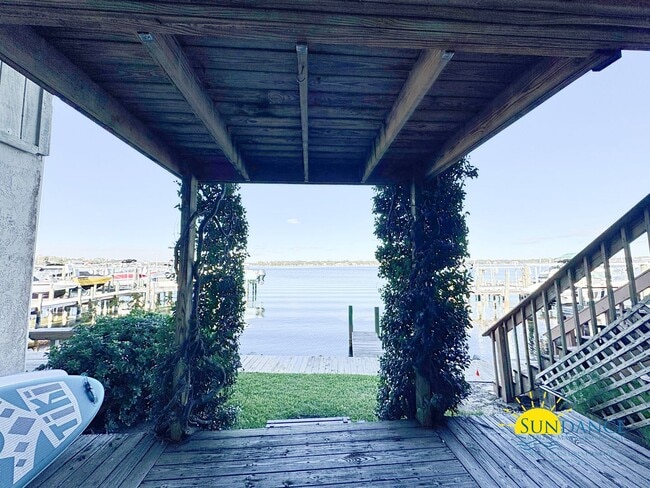 Building Photo - Waterfront Luxury Living on Garniers Bayou with Boat Slip/Lift Included!