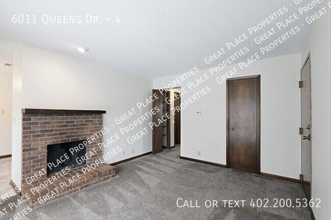 Building Photo - 6011 Queens Dr