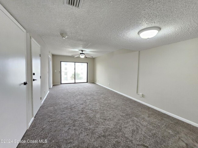 Building Photo - Coastal Paradise Awaits: Elegant 2-Bed, 2-...