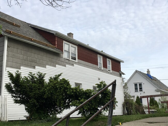 May 2021 ~ undergoing a new roof, siding, window wrapping, and chimney project! - 1225 W Madison St