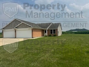 Building Photo - Country 3 Bedroom Apartment with 2 Car Garage