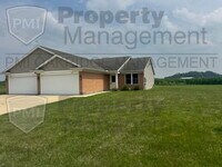 Building Photo - Country 3 Bedroom Apartment with 2 Car Garage
