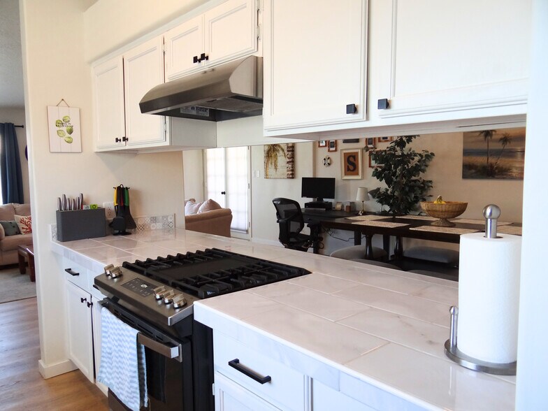Kitchen is fully equipped with all the cooking essentials, plus an air fryer & Instapot. - 8941 E 24th Ln
