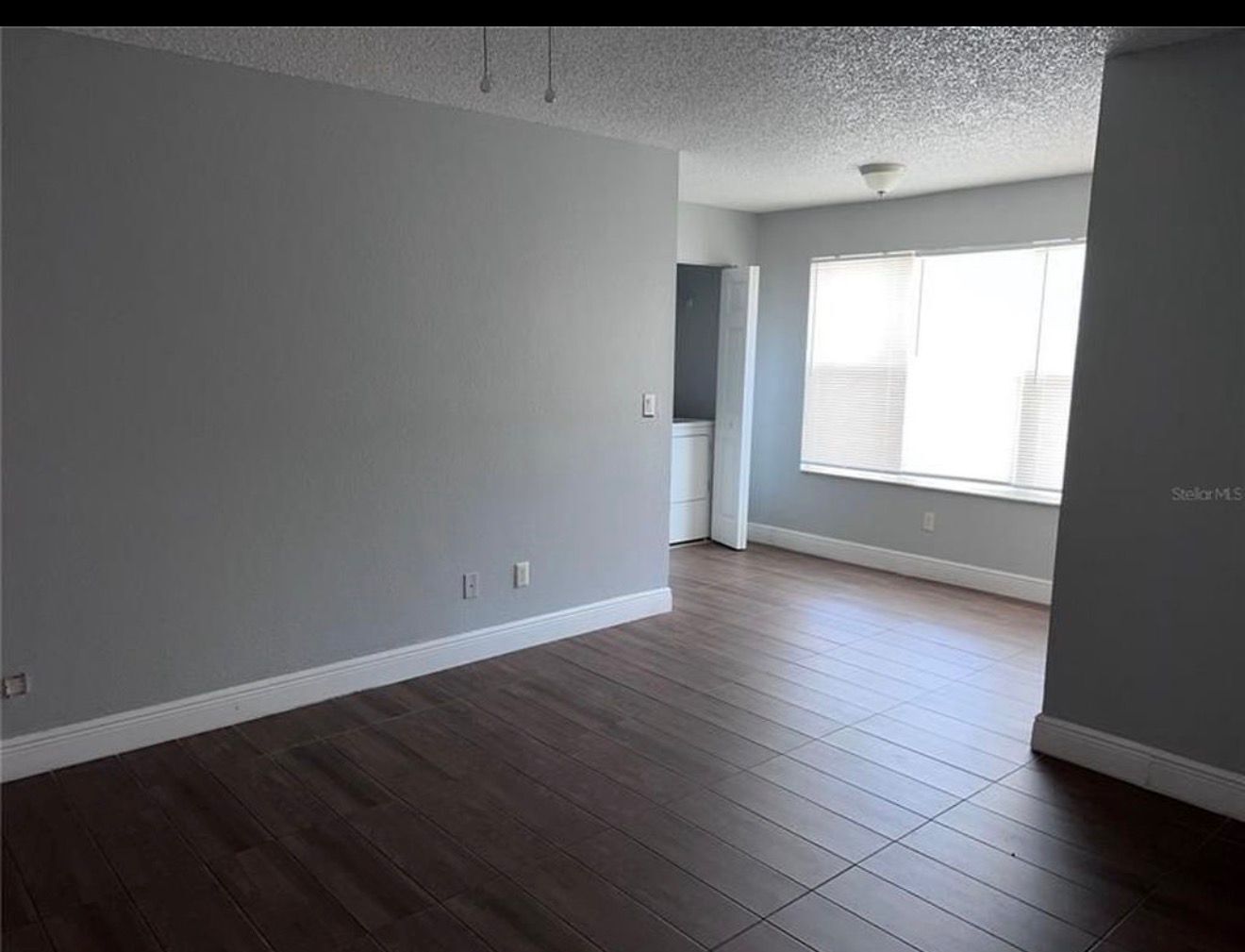 Living and Laundry - 4658 Commander Dr