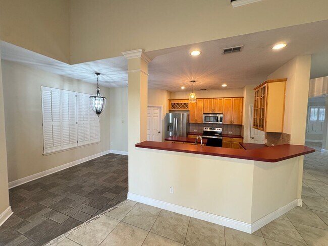 Building Photo - Spacious 4-Bedroom Home with Private Pool and Modern Comforts