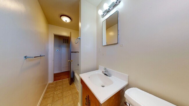 Building Photo - UPTOWN 3 Bedroom +Office  2 Bath with Garage