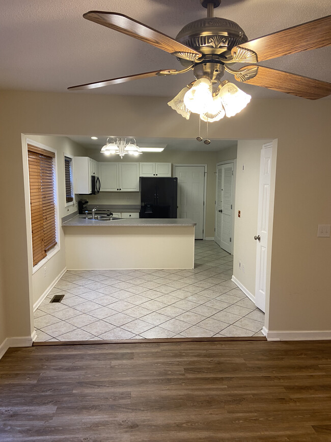 Eat-in kitchen opens to family room - 1309 Ujamaa Dr