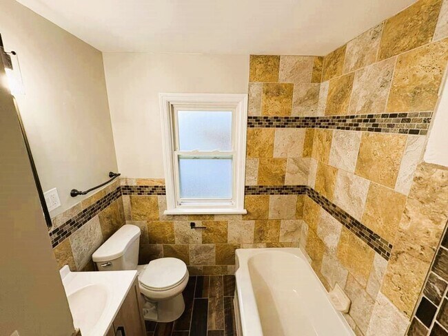 Building Photo - 4-Bedroom Home with Finished Basement & Mo...