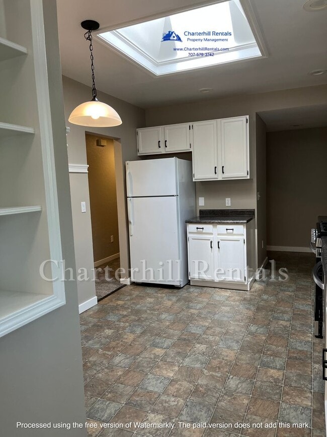 Building Photo - Move in special! Charming, updated home in...