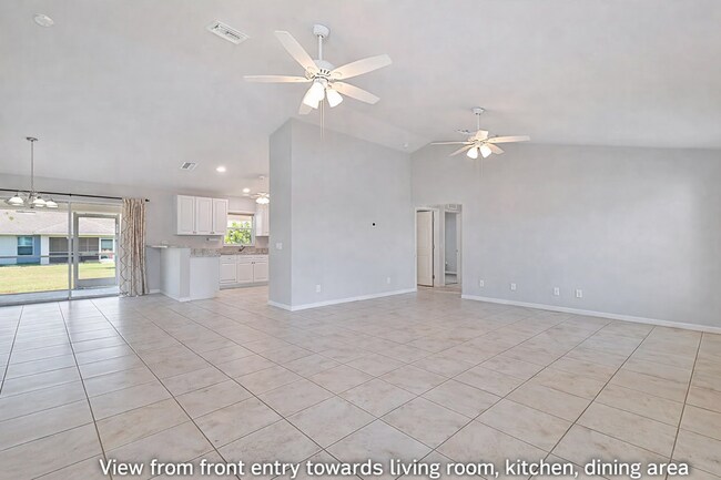 Building Photo - Spacious Three-Bedroom Home with Open Floor Plan, Large Yard & Screened Patio