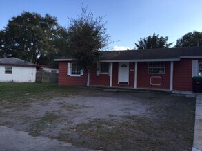 Building Photo - Spacious home on shaded lot off the main path