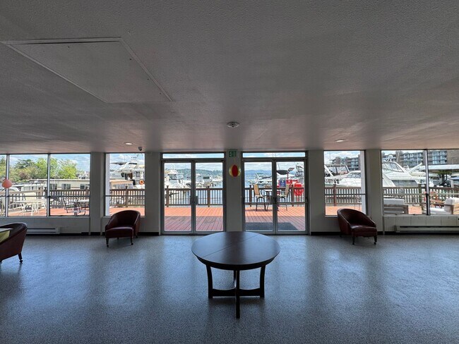 Building Photo - Updated 2-Bedroom Condo with Water Views, 2 Parking Spaces & Poolside Location