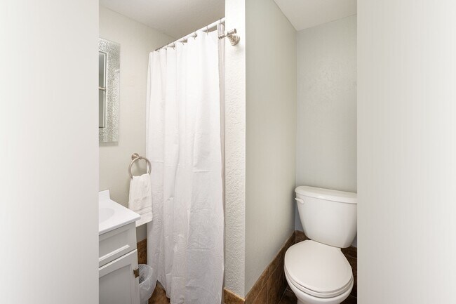 Main floor bathroom with shower. - 222 6th Ave SE