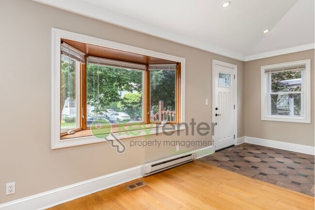 Building Photo - Spacious 3BR Home with Finished Attic, Fenced Yard & Easy NYC Commute – No Broker Fee