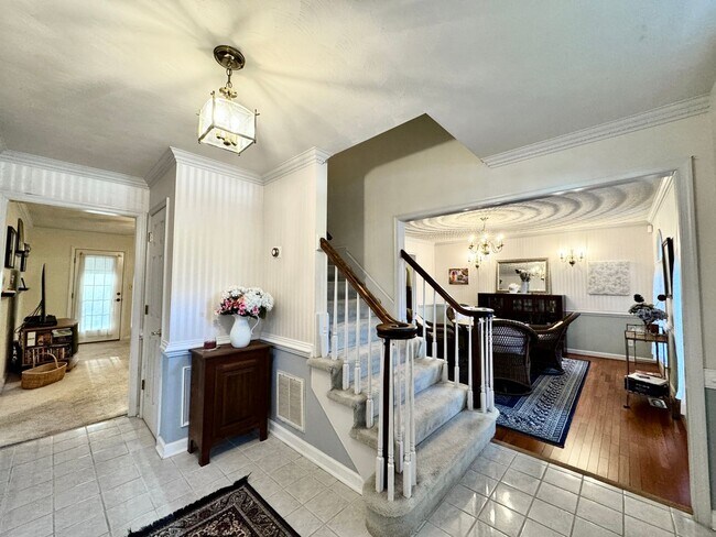 Building Photo - Fabulous 4-Bedroom Home w/2-Car Attached Garage! Dog Friendly - Screened Porch!