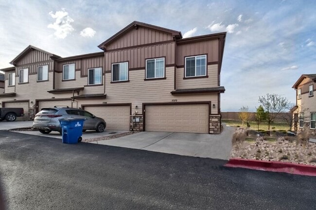 Building Photo - Immaculate 3-Bedroom Townhome with Stainless Steel Appliances and Attached Garage Near Peterson SFB