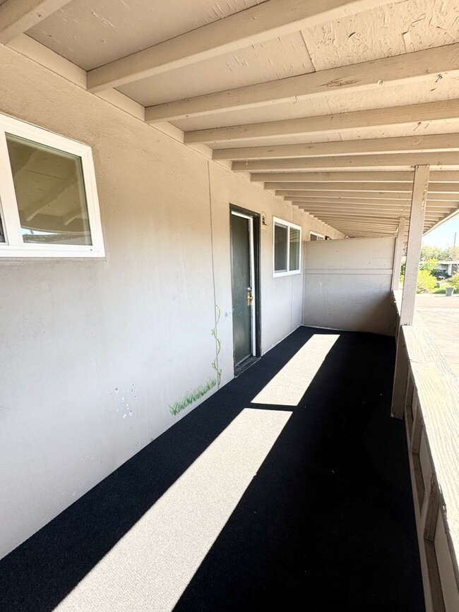 Building Photo - Move-In Special; Upstairs One Bedroom + Private Patio SEE VIDEO