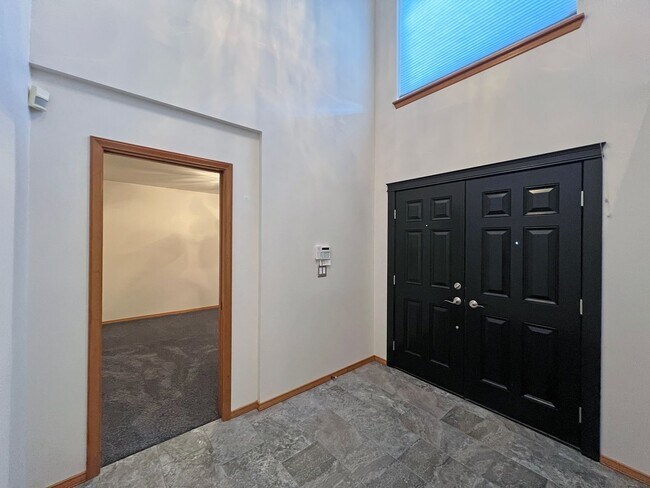 Building Photo - Stunning 4 Bedroom 2.5 Bath with Peek-a-Boo View of Puget Sound