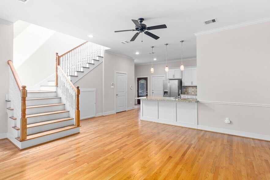 Wide stairs to second floor. Lots of natural light - 1221 W 23rd St