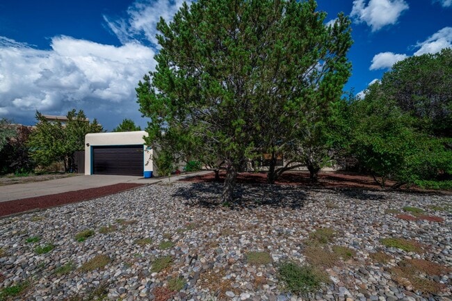 Building Photo - NEW MOVE-IN SPECIAL! Vibrant Home Off Rode...