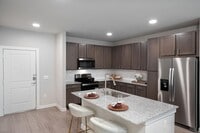 Building Photo - Rents Just Dropped – And We’re Waiving You...