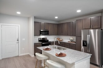Building Photo - Rents Just Dropped – And We’re Waiving You...