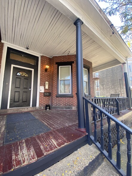 welcome to The Wheeler spacious front porch for residents - 217 Hamilton Ave